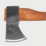 a close up of the esker camp axe head. with "esker" stamped into the axe head. 