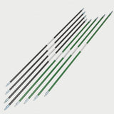 Set of green and black multi tent poles on a light gray background