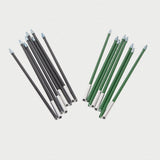 Set of black and green multi tent poles, folded, on a light gray background