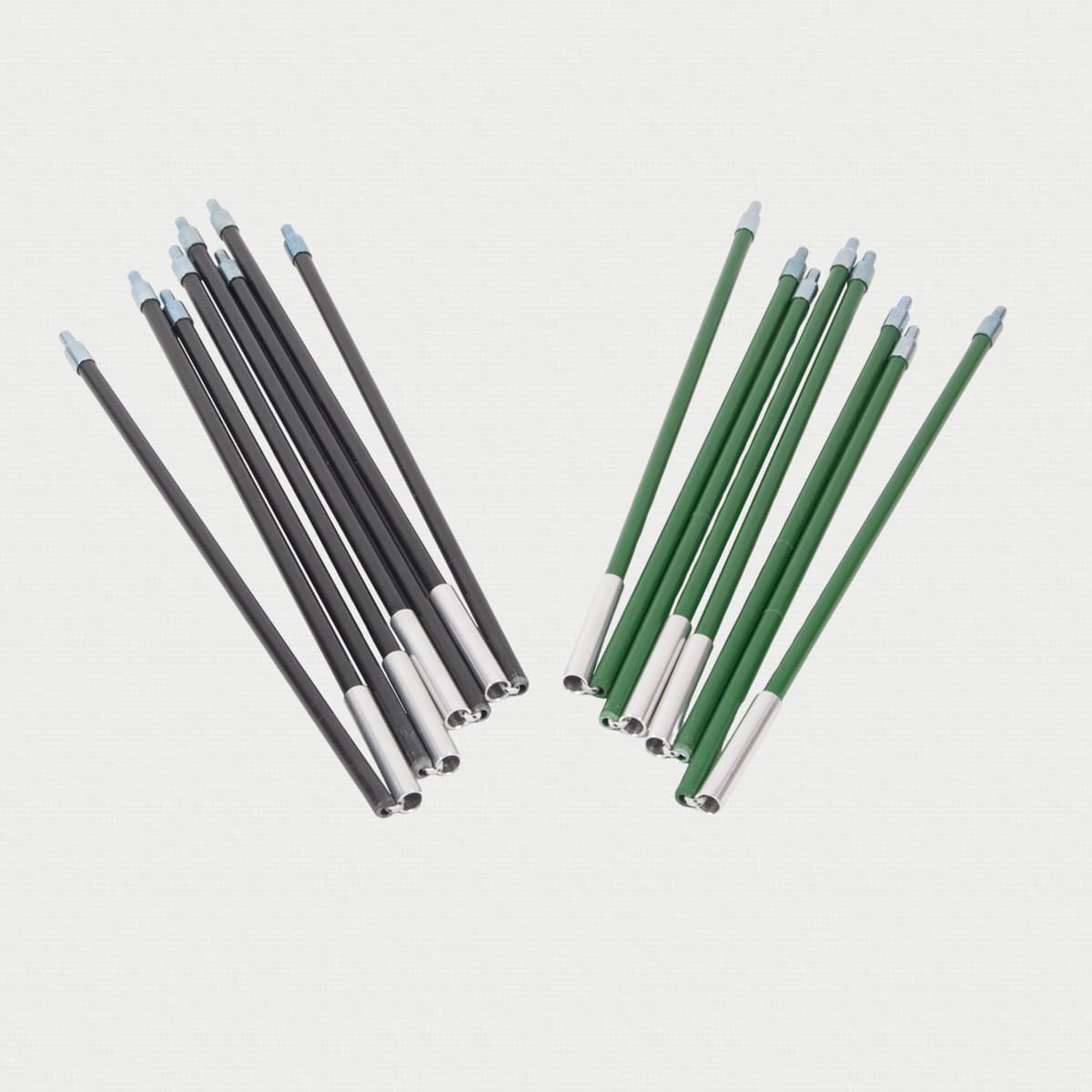 Set of black and green multi tent poles, folded, on a light gray background